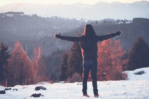 Guy on the snow, with open arms Stock Photos