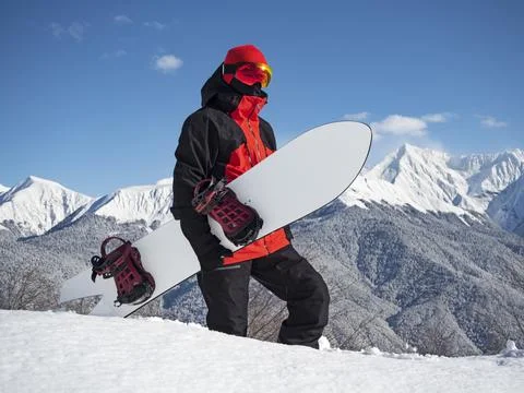 Guy with snowboard Stock-Fotos