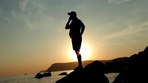 The guy speaks on the phone Stock Footage 51364600