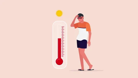 The guy is standing on the beach near the thermometer, he is very hot motion Stock Footage 145278878