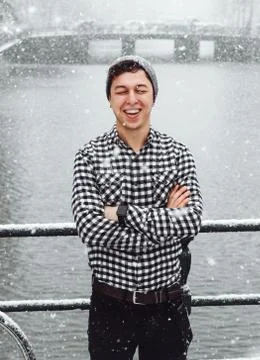 Guy is standing on a bridge Stock Photos