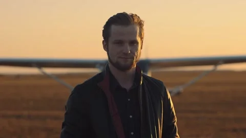 A guy standing in front of an airplane. Stock Footage 279915109