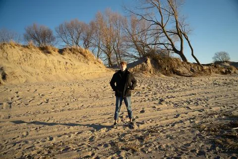 The guy is standing in the middle of the wild Stock Photos