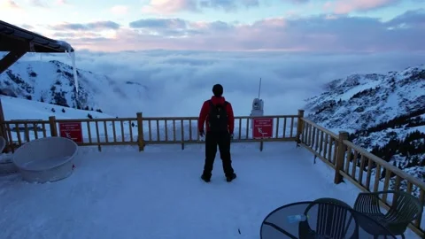 The guy is standing on the playground in mountains Video stock 225427240