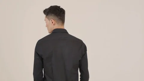 Guy Stands with his Back Stock Footage 87975157