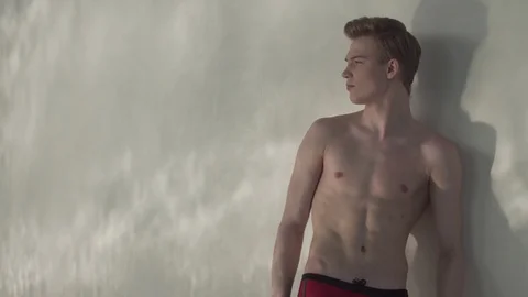 Guy stands by the pool Stock Footage 127181349