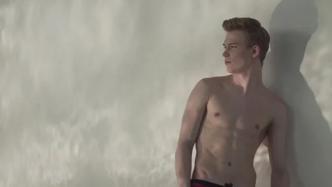 Guy stands by the pool Stock Footage 127181356