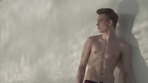 Guy stands by the pool Stock Footage 127181424