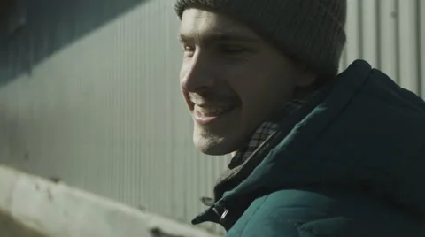 The guy on the street smiling Vídeo Stock 60066173