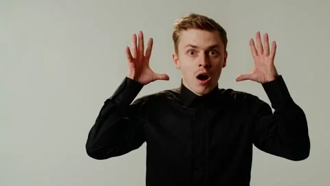 A guy student is experiencing a brain explosion from emotional overload or Stock Footage 253035902