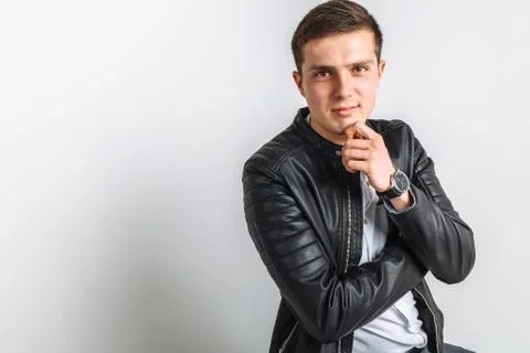 The guy in the Studio. The guy in the black jacket. Handsome guy Stock Photos