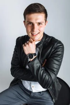 The guy in the Studio. The guy in the black jacket. Handsome guy Stock Photos