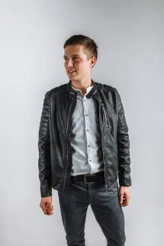 The guy in the Studio. The guy in the black jacket. Handsome guy Stock Photos