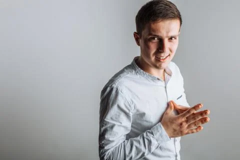 The guy in the Studio. The guy in the white shirt. Handsome guy. Stock Photos