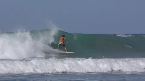 A Guy Surfing A Wave Stock Footage 107609502