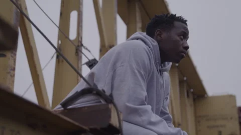 Guy In Sweatsuit Sits On Train Stock Footage 270325823