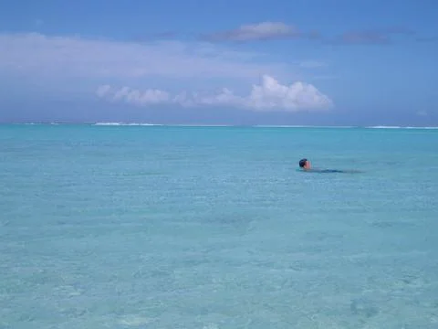 Guy swimming in ocean 写真素材