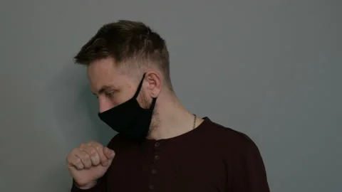 The guy with the symptoms of the disease on a gray background. Stock Footage 133503596
