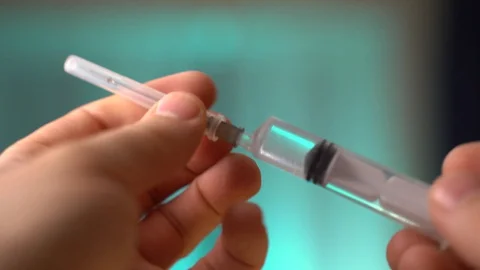 The guy with the syringe Stock Footage 128691937