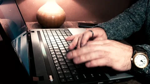 The guy at the table working on laptop and smartphone Stock Footage 56251636