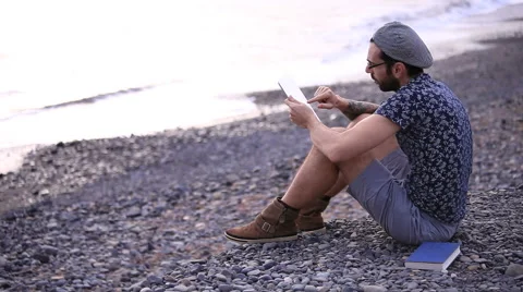 A guy with a tablet  Stock Footage 58261719