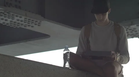 The guy with the tablet, the phone in the city, UHD Stock Footage 65368259