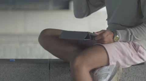 The guy with the tablet, the phone in the city, UHD Video stock 65368727
