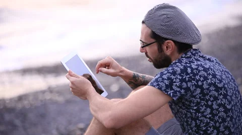 A guy with a tablet take a photo Stock Footage 58260044