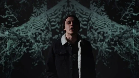 Guy takes off his jacket Stock Footage 80517081