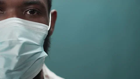 The guy takes off his mask, throws it away and shows that he is pleased with Stock Footage 170671985