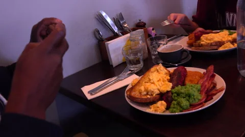 Guy Taking a Picture of Breakfast with his Phone Stock Footage 67857577