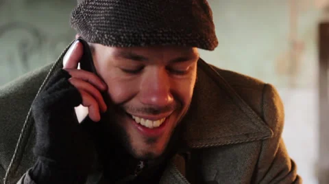 Guy  talking with cell phone and smiling ,close up shot Stock Footage 34329043