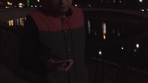 The guy talking on the phone and smiling Stock Footage 80418934