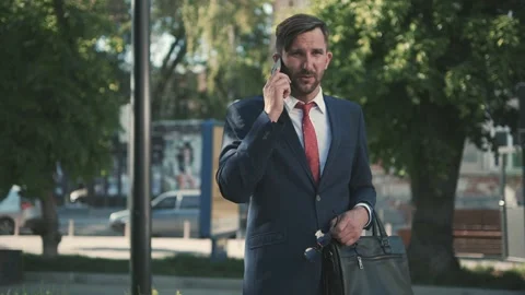 The guy is talking on the phone. Stock Footage 187021658