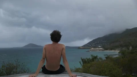 Guy thinking and staring at ocean Stock Footage 152492671