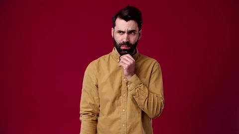 The guy thinks but has no idea what to do next Stock Footage 165620678