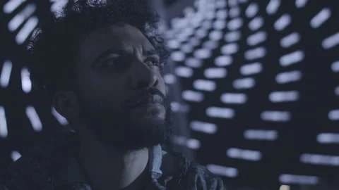 Guy Thinks Under Lights Stock Footage 217582762