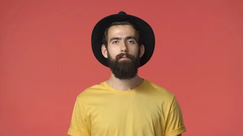 Guy thinks you got point, agree with good plan. Handsome bearded middle-eastern Stock-Footage 115780046