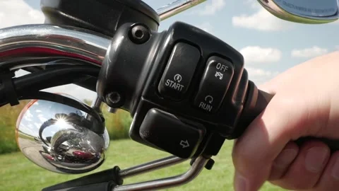 Guy is throtting on his powerful motorcycle, pulling on the throttle, harley Video stock 138035331