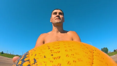 The guy throws the ball up.Training with the ball.Beach sports. Stock Footage 96990997