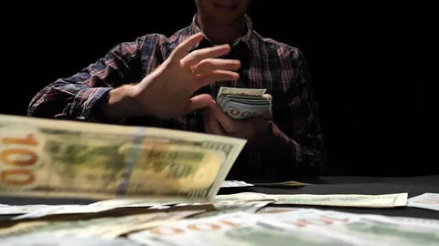 The guy throws money at the camera in slow motion. Stock Footage 129786383