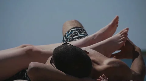 Guy tickling woman's foot | Stock Video