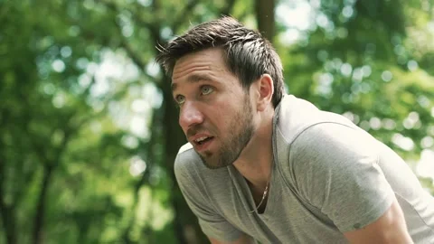 The guy is tired after jogging Stock Footage 139590506