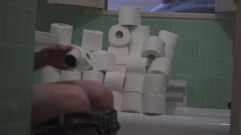 GUY TOO MUCH TOILET PAPER Stock Footage