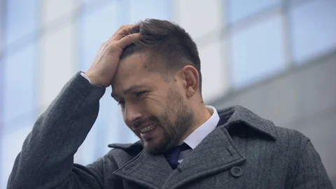 Guy touching head feeling terrible pain, migraine headaches, weather changes Video stock 119286083