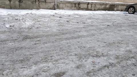 A guy in town with a backpack in winter Stock Footage 106346635