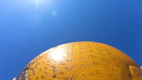 The guy is training with the ball.Throws the ball up.Beach sports. Stock Footage 96991023