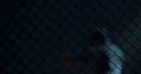 Guy training behind the net Stock Footage 181857999