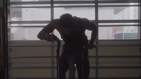 Guy Training On Exercise Bike Stock Footage 270323341