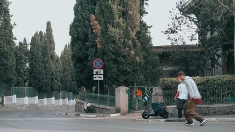 The guy is training parkour. Jumps on the railing on a cold autumn day. Does a Stock Footage 120423021